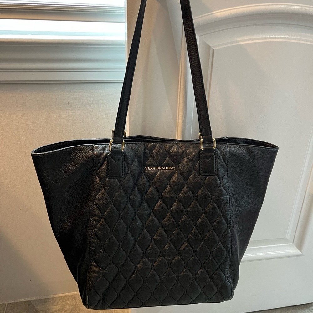 Black leather Vera Bradley shoulder bag.